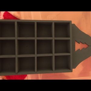 I’m selling a jewelry holder that you hang up.